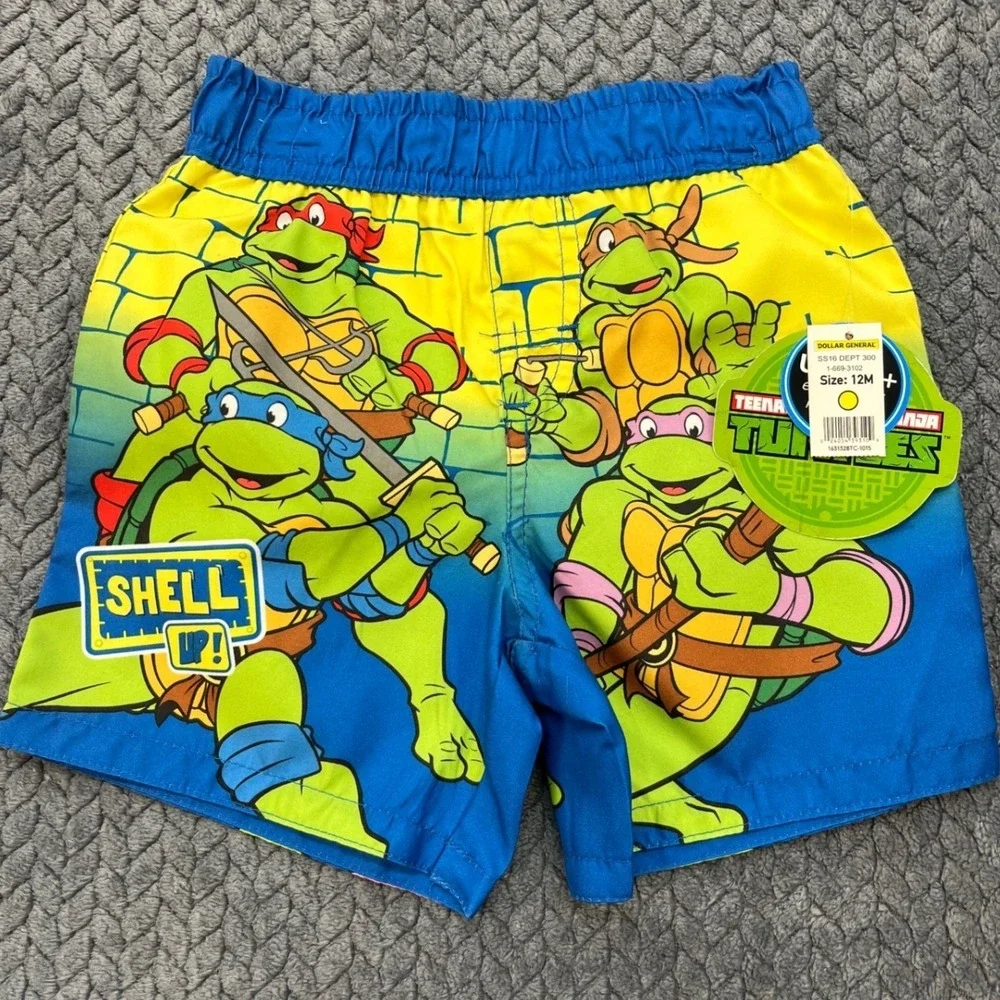 TMNT Shell Up Boys Blue Yellow Nickelodeon Swim Trunks Graphic Mesh Lined 12M